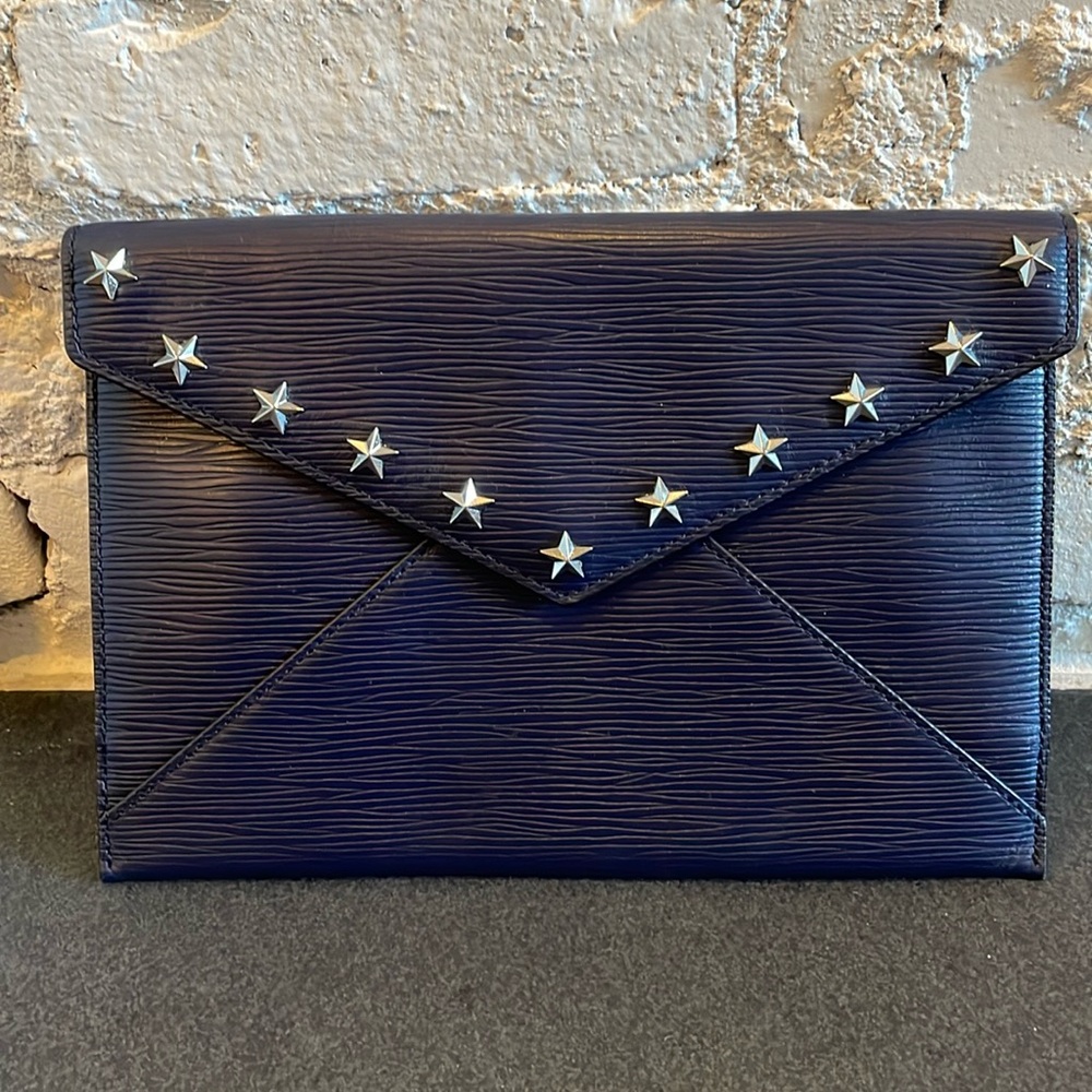 Rebecca Minkoff Navy leather clutch with silver star studs. Approx. 7”x10.5”